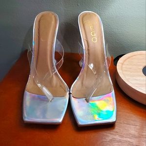 Clear Holographic Heels